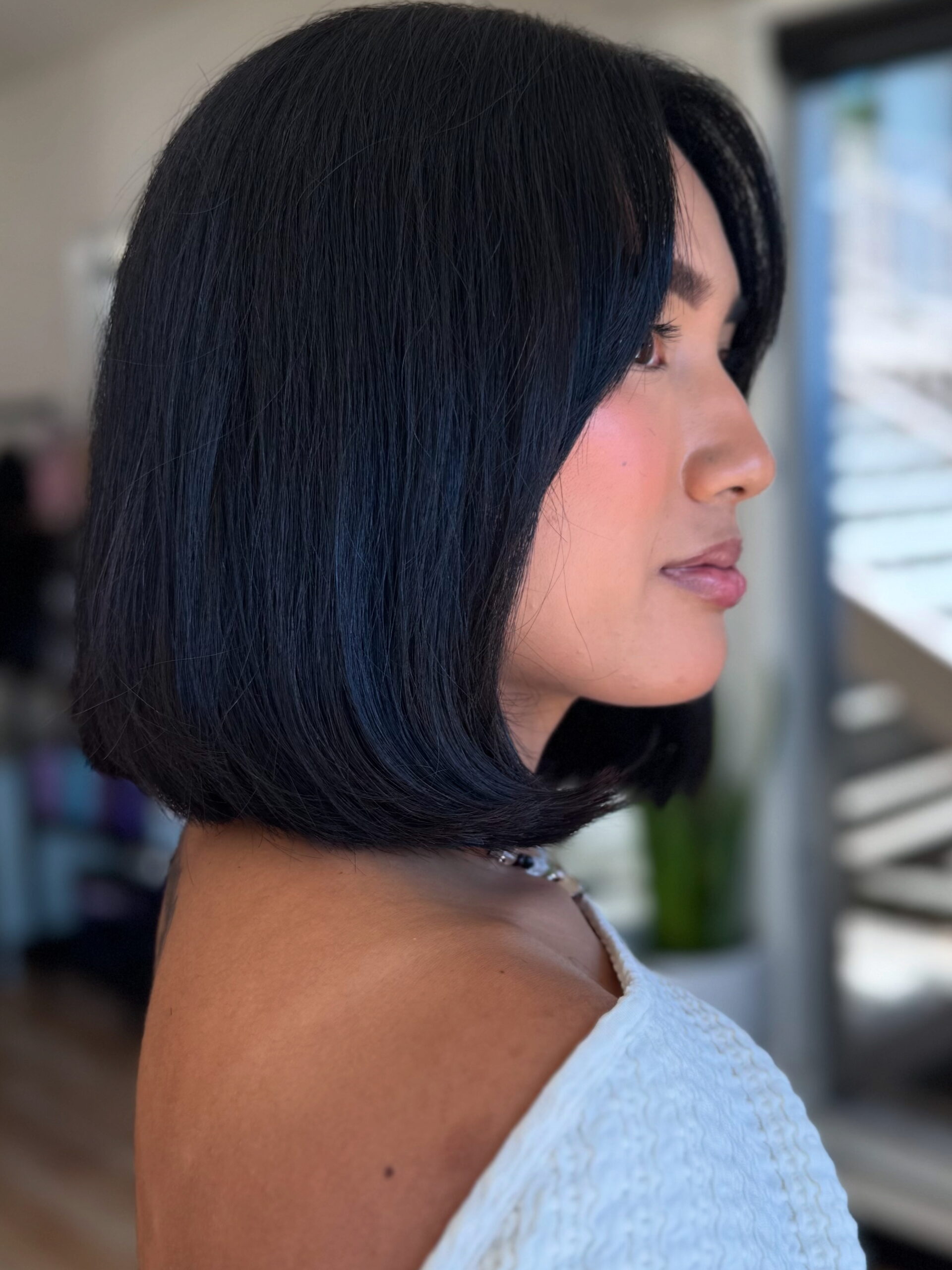 sharp blunt bob with bangs by a stylist at willow hair, eugene OR