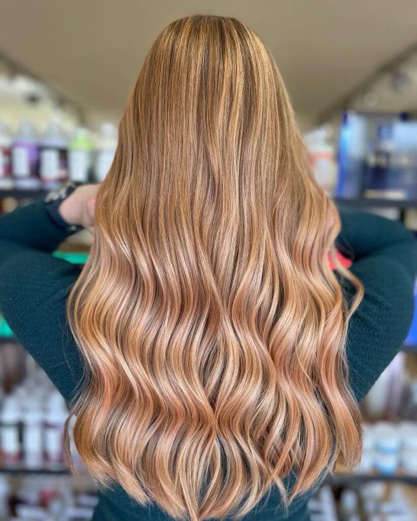 long strawberry-blonde balayage, color correction result by a stylist at willow hair, eugene OR
